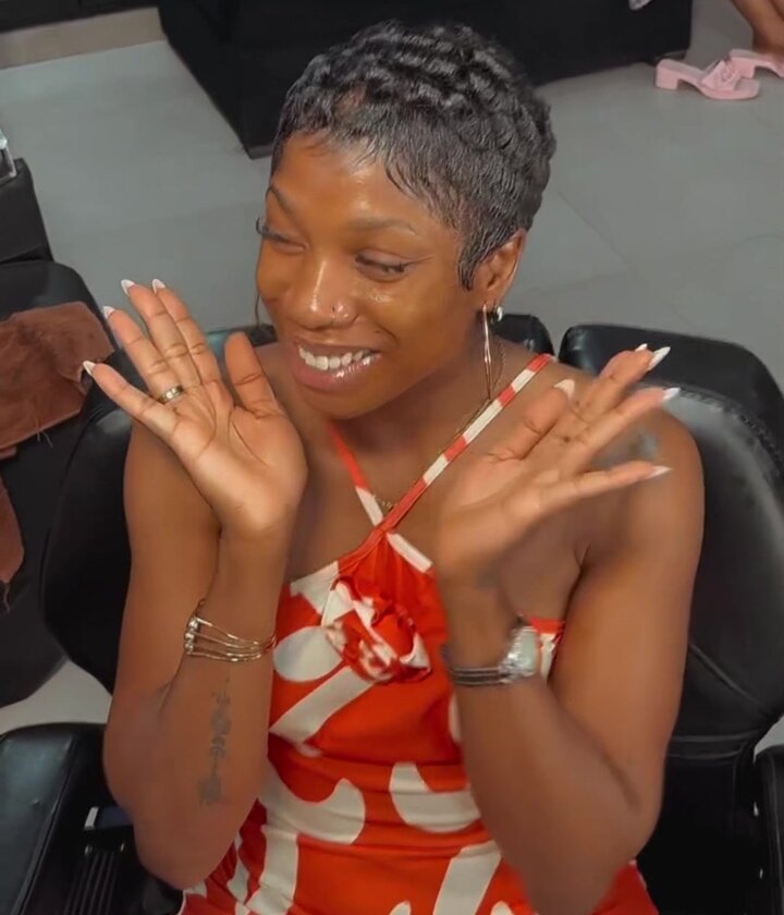 After: a short pixie cut set in sculpted finger waves