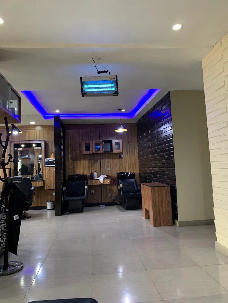 Hair wash stations under the blue LED cove light